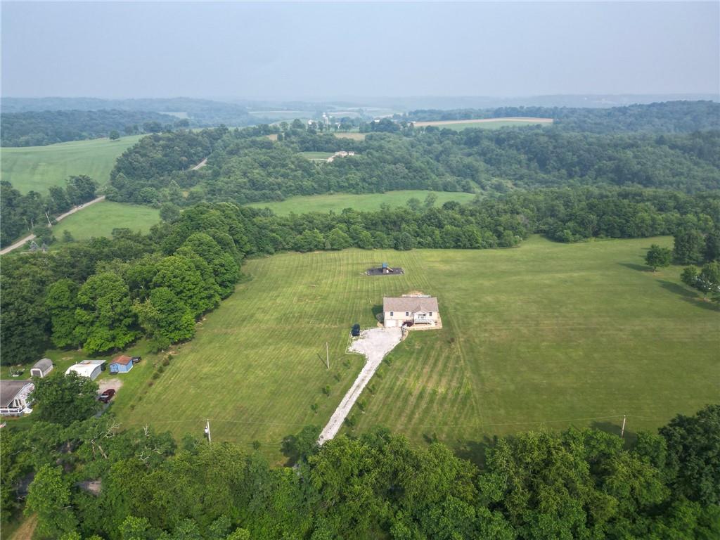 667 Ridge Road Georgetown, PA 15043 - Photo 23 of 27 a view of a golf course with a lake
