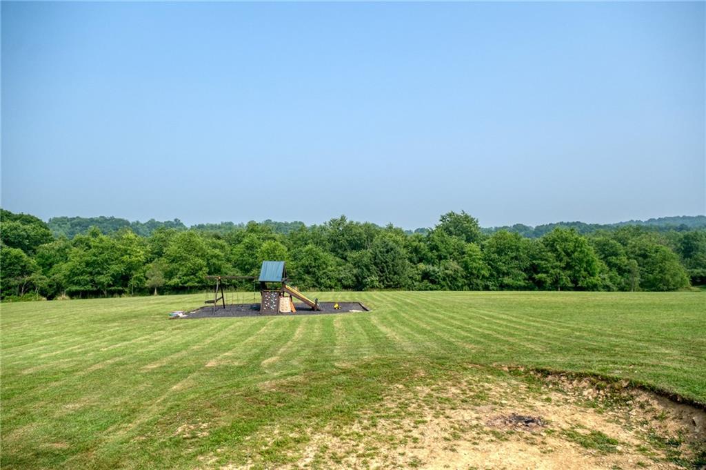 667 Ridge Road Georgetown, PA 15043 - Photo 24 of 27 a view of a green field with clear sky