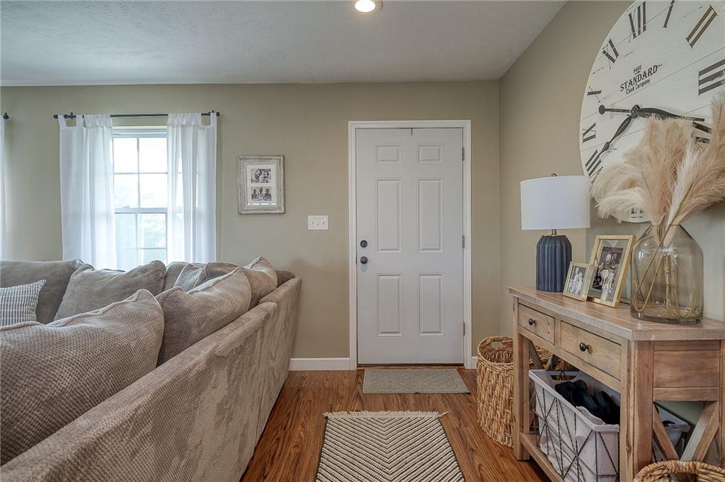 667 Ridge Road Georgetown, PA 15043 - Photo 3 of 27 a living room with furniture and a baby crib