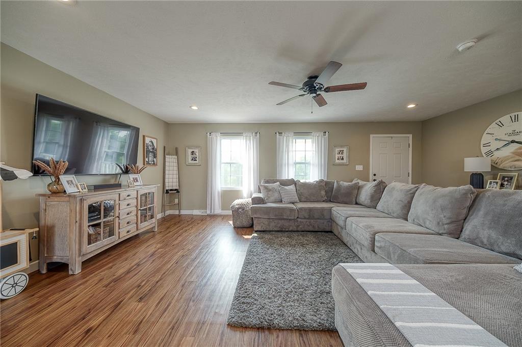 667 Ridge Road Georgetown, PA 15043 - Photo 10 of 27 a living room with furniture and a flat screen tv