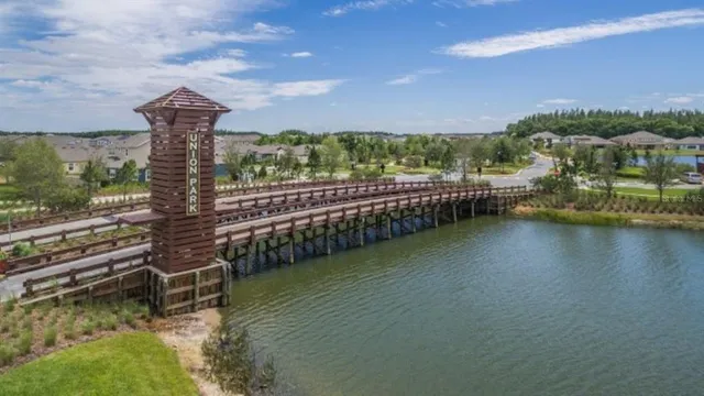 a view of a lake with a bench and lake view