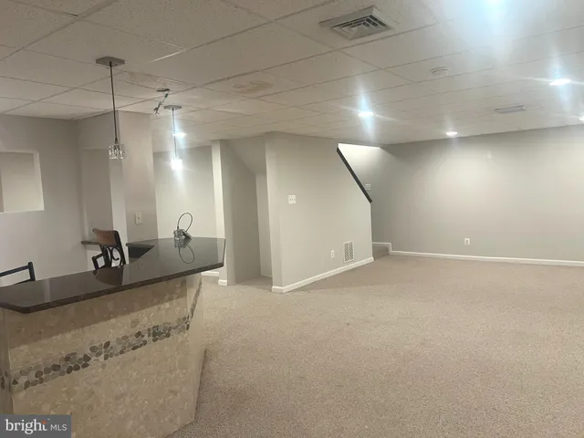 a view of a room with a mirror