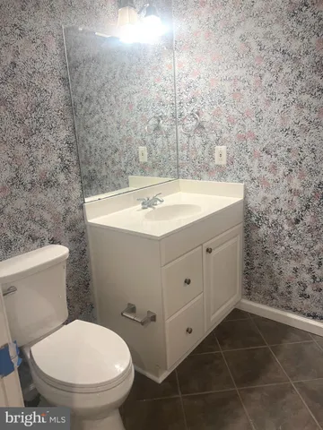 a bathroom with a sink and a toilet