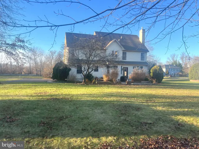 a view of a house with a swimming pool