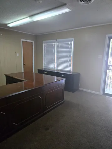 a room with furniture and window