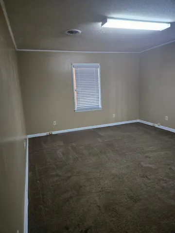 a view of an empty room with window