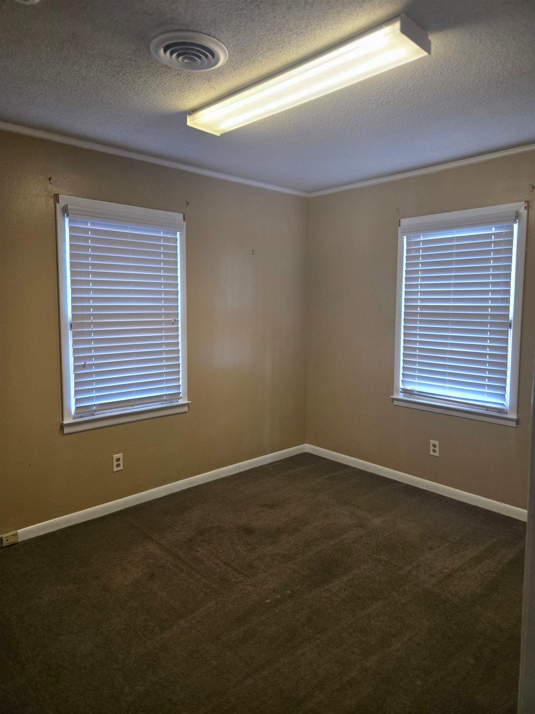 6855 Raleigh Lagrange Road Memphis, TN 38134 - Photo 5 of 13 a view of an empty room with a window