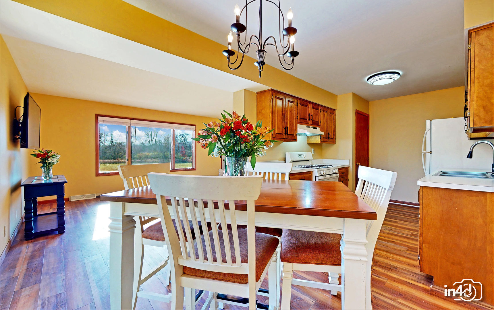 272 Circlegate Road New Lenox, IL 60451 - Photo 8 of 24 a view of a dining room with furniture window and wooden floor