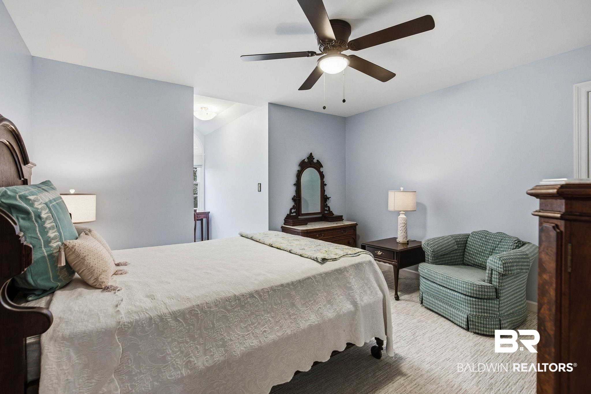 31515 Rhett Drive Spanish Fort, AL 36527 - Photo 54 of 100 Bedroom 4 measures 12' 11" x 20' 9" and has a walk in closet with locked storage, wooden shelving, a ceiling fan and walk out attic access. Additional space for a desk or sitting area by the dormer.
