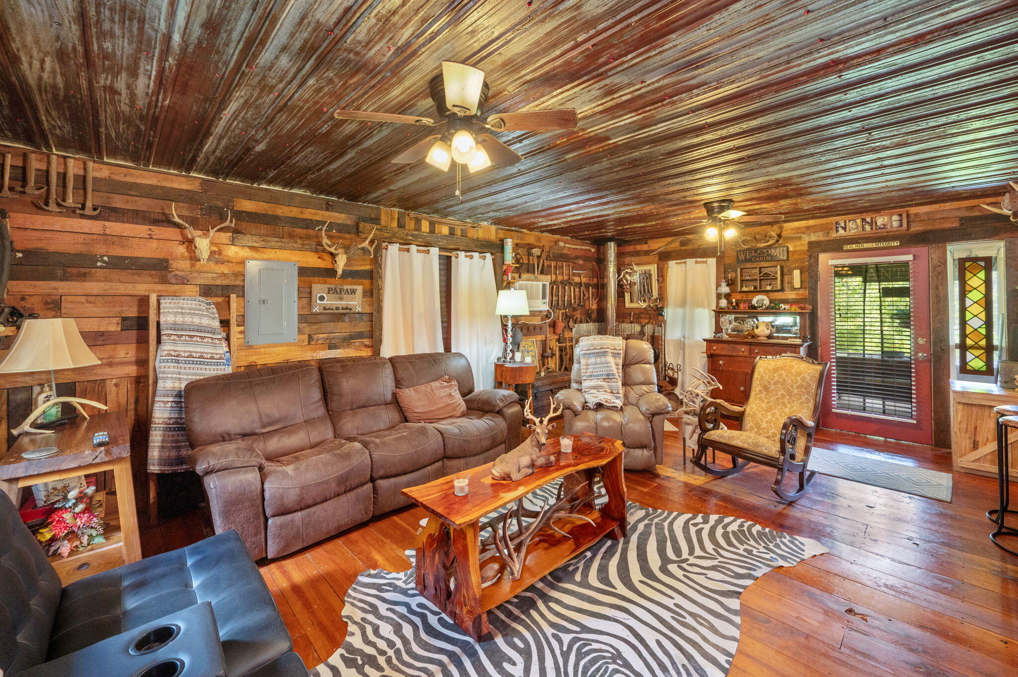 54 Wing Road Wing, AL 36483 - Photo 11 of 50 a living room with furniture and a wooden floor