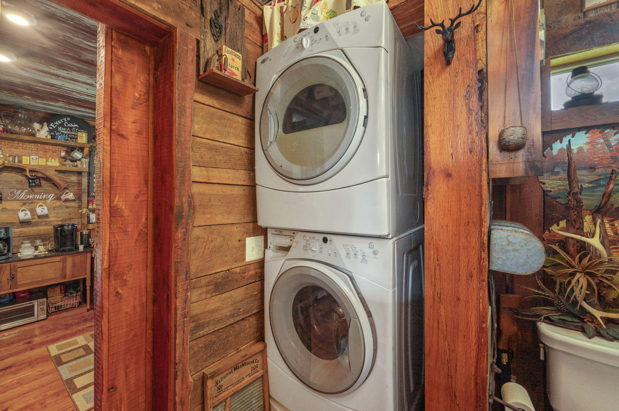 54 Wing Road Wing, AL 36483 - Photo 15 of 50 a utility room with dryer and washer