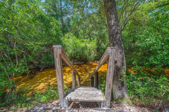 a view of a swimming pool with an outdoor space