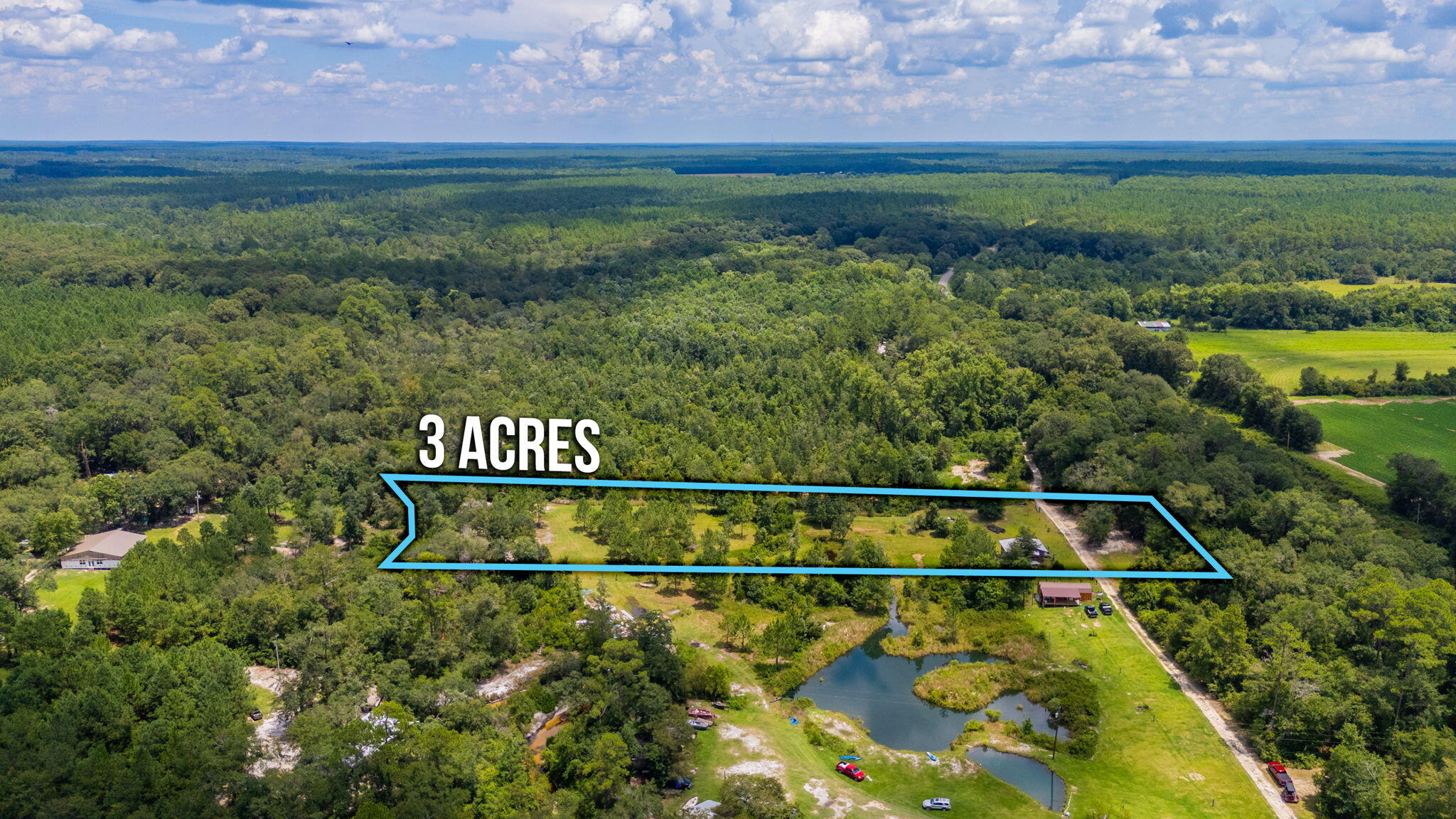 54 Wing Road Wing, AL 36483 - Photo 3 of 50 a view of a tennis court