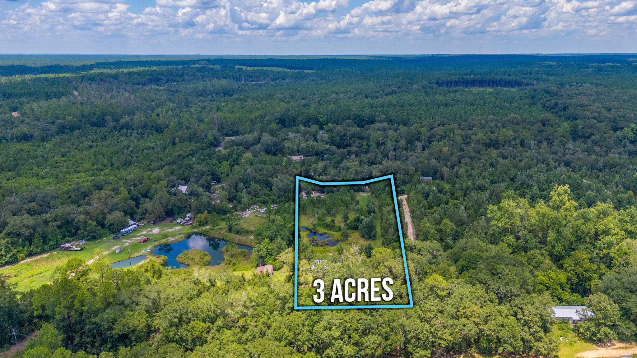 54 Wing Road Wing, AL 36483 - Photo 37 of 50 a view of a back yard