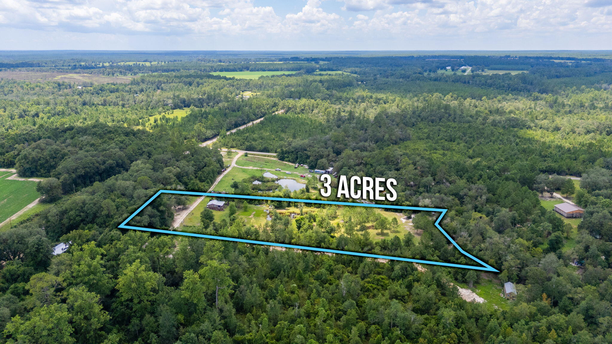 54 Wing Road Wing, AL 36483 - Photo 40 of 50 a view of a back yard from a balcony