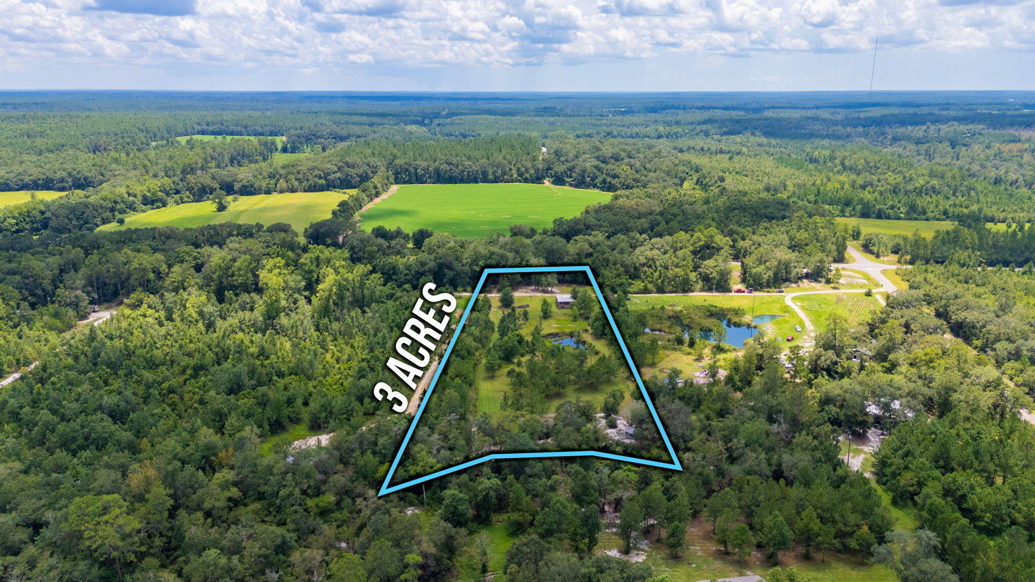 54 Wing Road Wing, AL 36483 - Photo 42 of 50 an aerial view of a yard