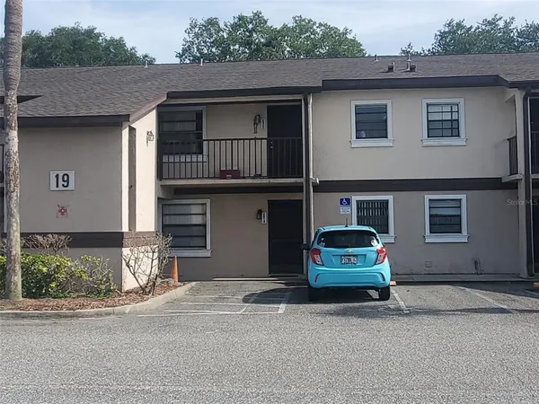 a car parked in front of a house