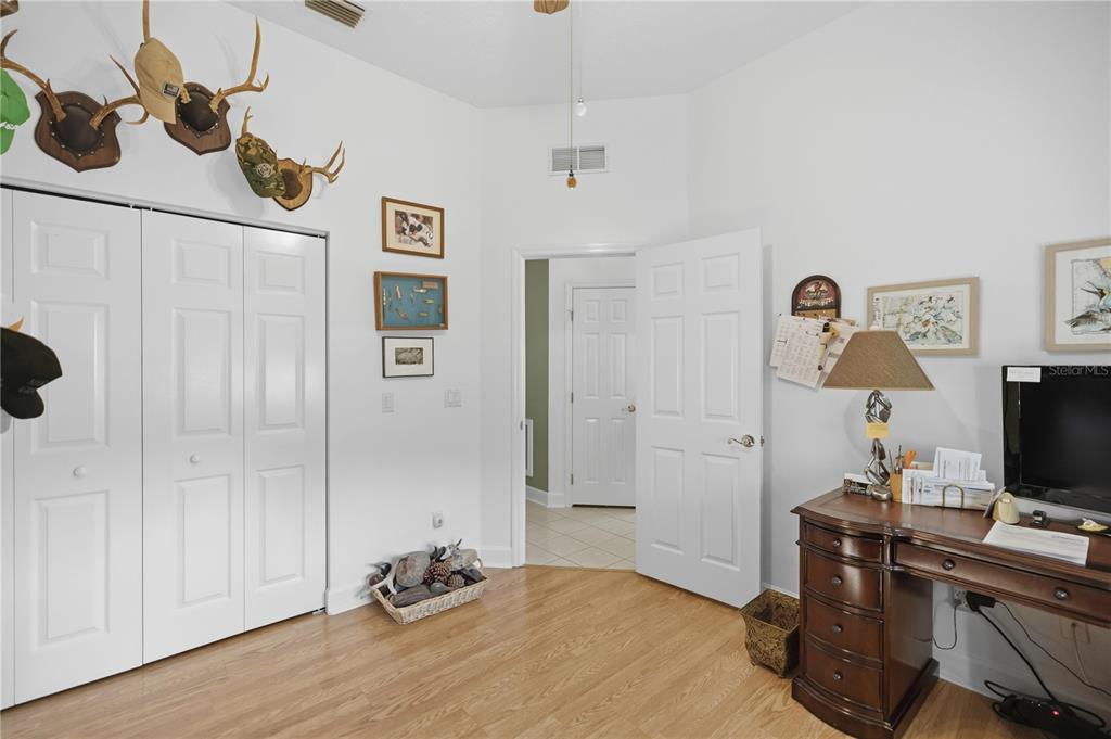 700 Southwest 89th Terrace Ocala, FL 34481 - Photo 25 of 94 a bedroom with a workspace