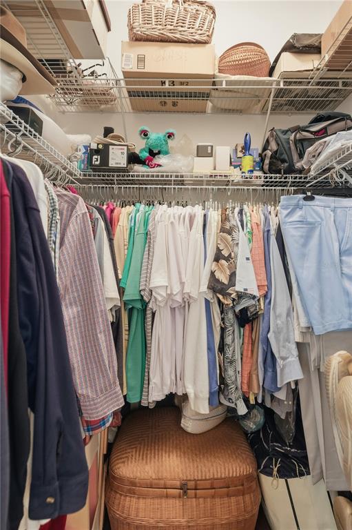 700 Southwest 89th Terrace Ocala, FL 34481 - Photo 32 of 94 a view of walk in closet with clothes and shoes