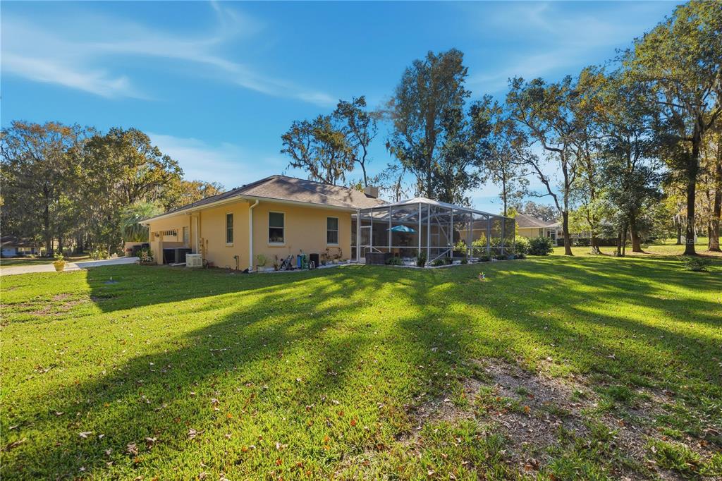 700 Southwest 89th Terrace Ocala, FL 34481 - Photo 42 of 94 a front view of house with yard and green space