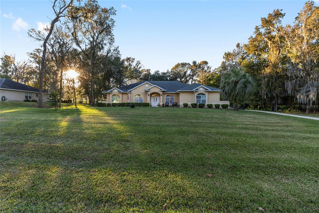 700 Southwest 89th Terrace Ocala, FL 34481 - Photo 52 of 94 a view of a house with a yard