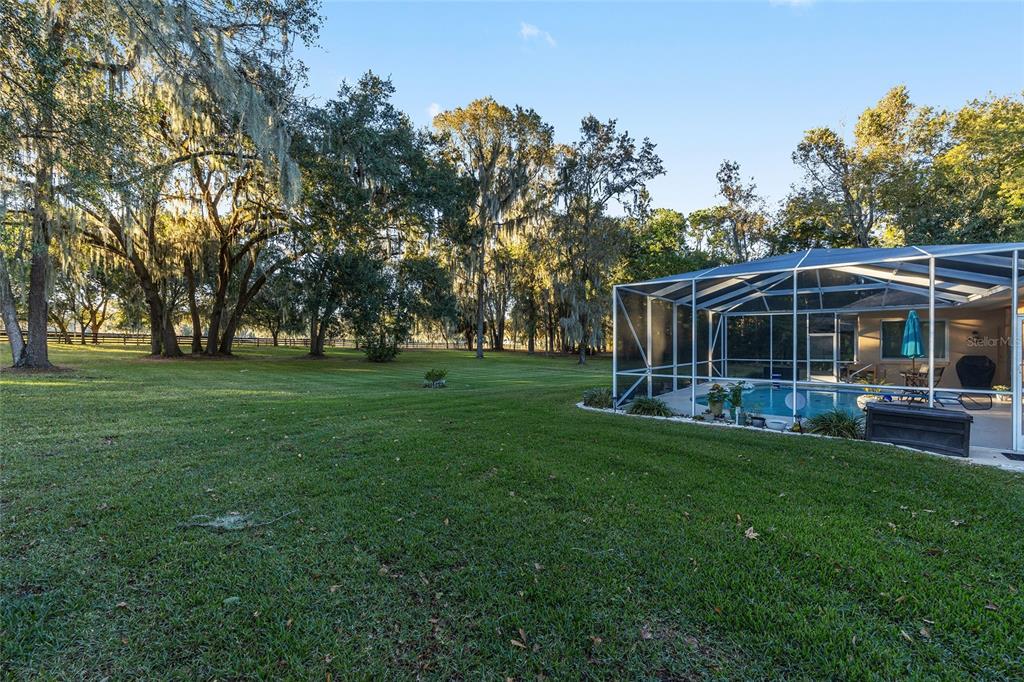 700 Southwest 89th Terrace Ocala, FL 34481 - Photo 59 of 94 a view of a house with a yard