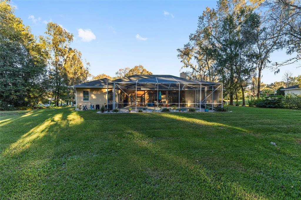 700 Southwest 89th Terrace Ocala, FL 34481 - Photo 66 of 94 a front view of a house with a yard table and chairs