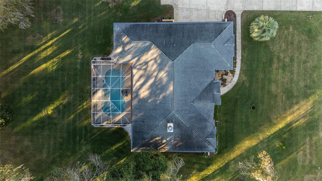 700 Southwest 89th Terrace Ocala, FL 34481 - Photo 87 of 94 an aerial view of residential houses with outdoor space and trees