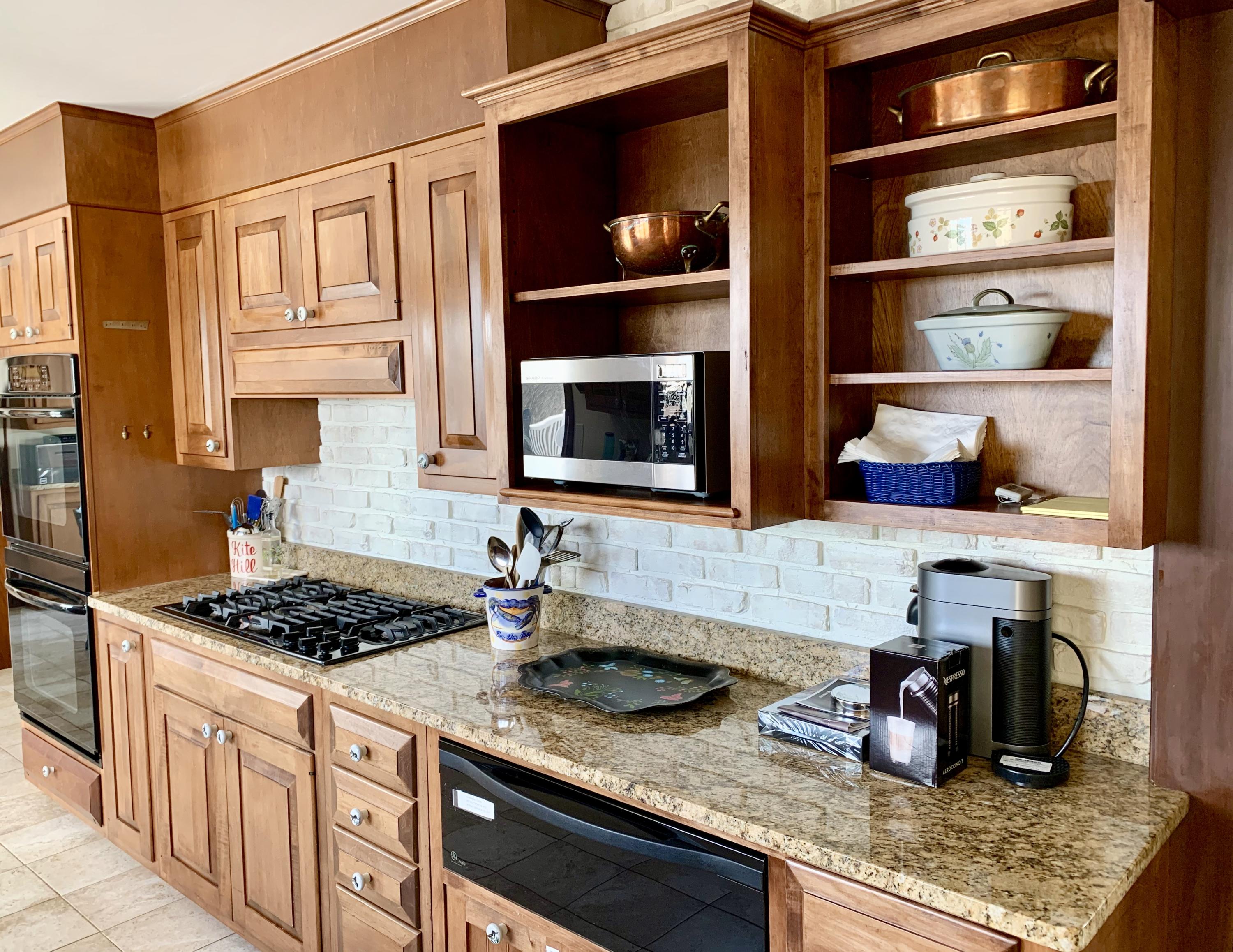 265 Bay Road Harwich, MA 02645 - Photo 11 of 38 a kitchen with lots of counter top space and a window