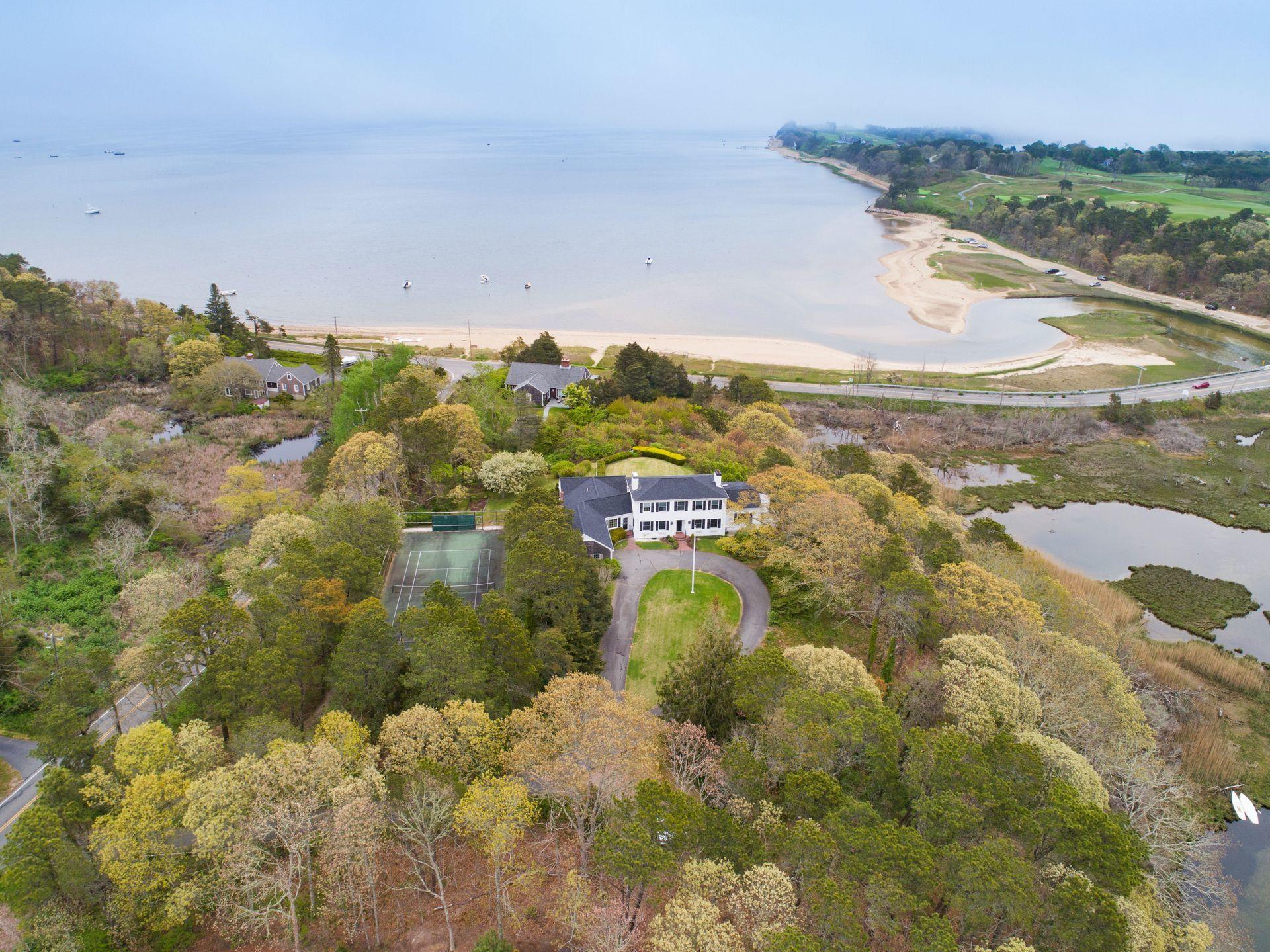 265 Bay Road Harwich, MA 02645 - Photo 29 of 38 a view of a lake with mountains in the background