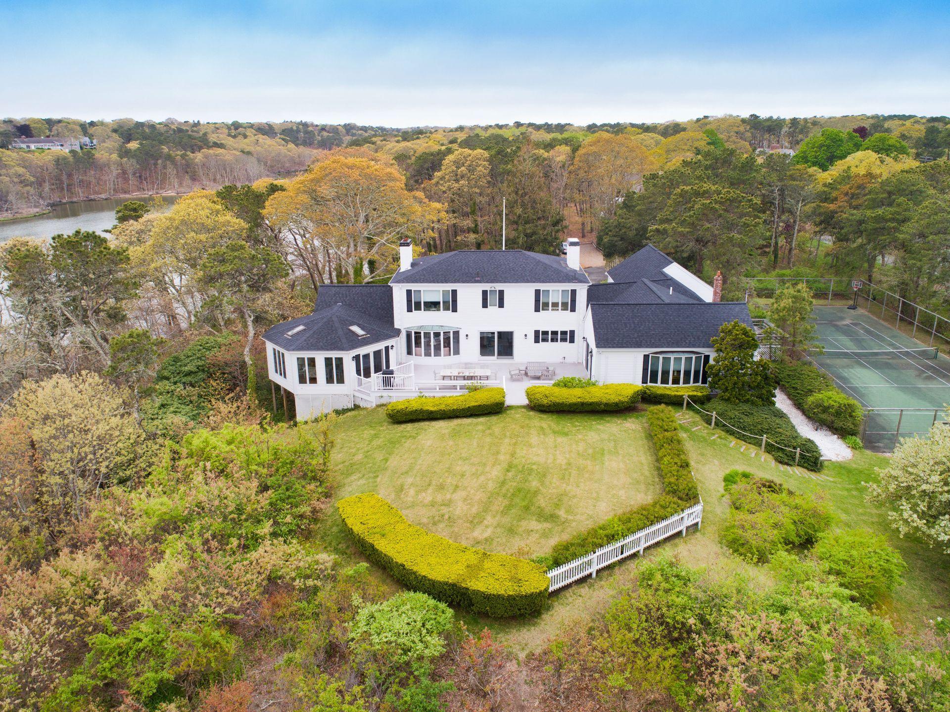 265 Bay Road Harwich, MA 02645 - Photo 30 of 38 an aerial view of residential houses with outdoor space and swimming pool