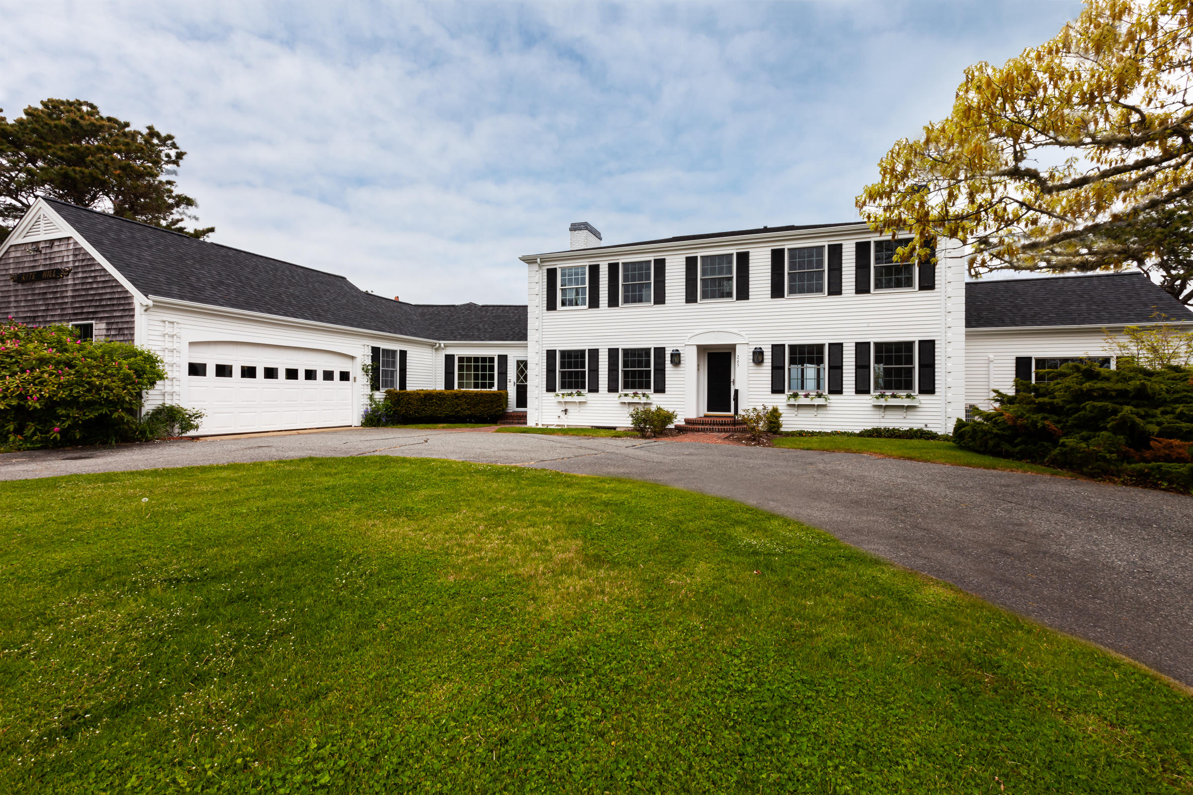 265 Bay Road Harwich, MA 02645 - Photo 3 of 38 a view of an apartment with a garden