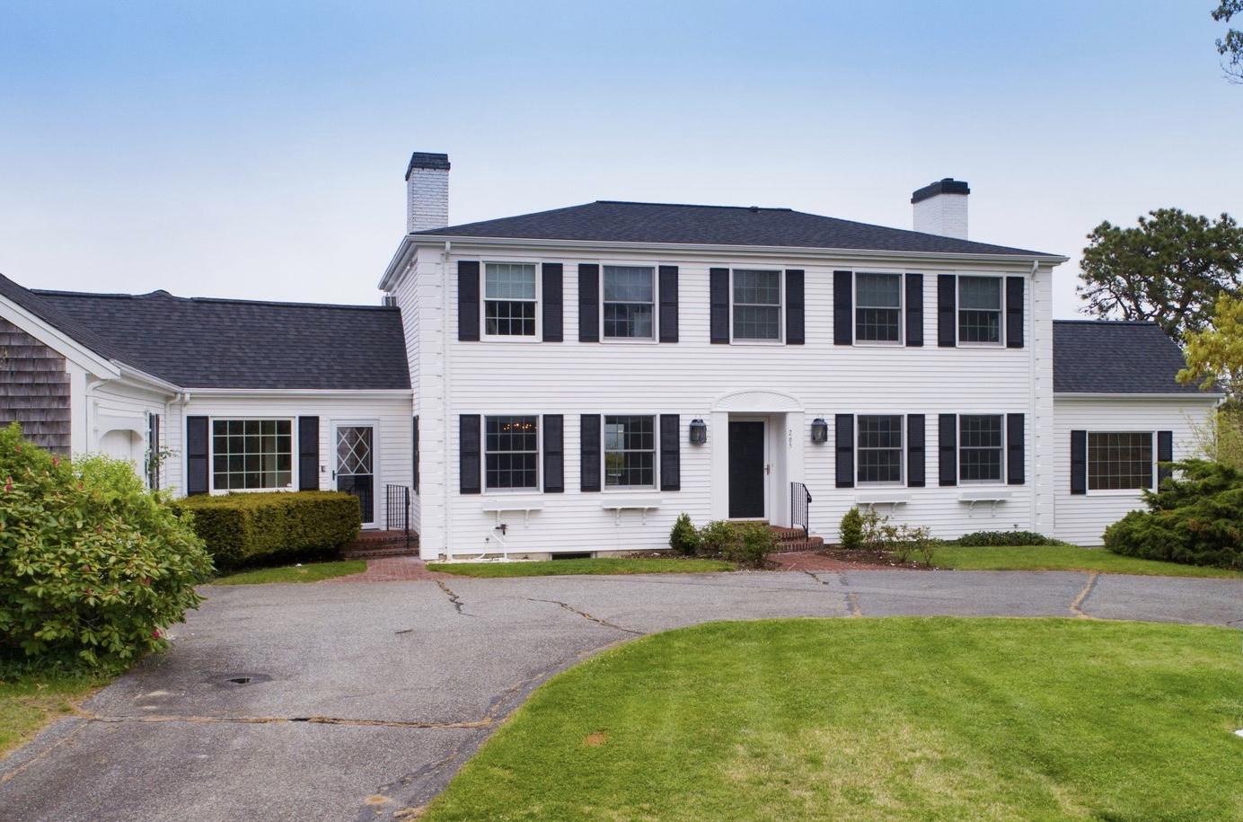 265 Bay Road Harwich, MA 02645 - Photo 34 of 38 a front view of a house with a yard