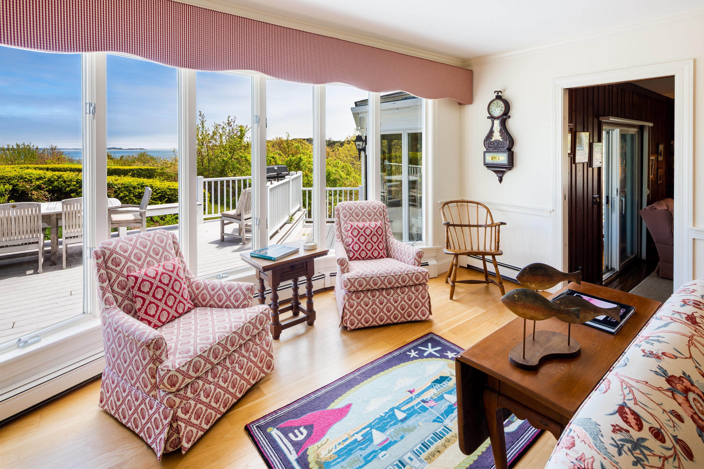 265 Bay Road Harwich, MA 02645 - Photo 4 of 38 a living room with furniture and a floor to ceiling window