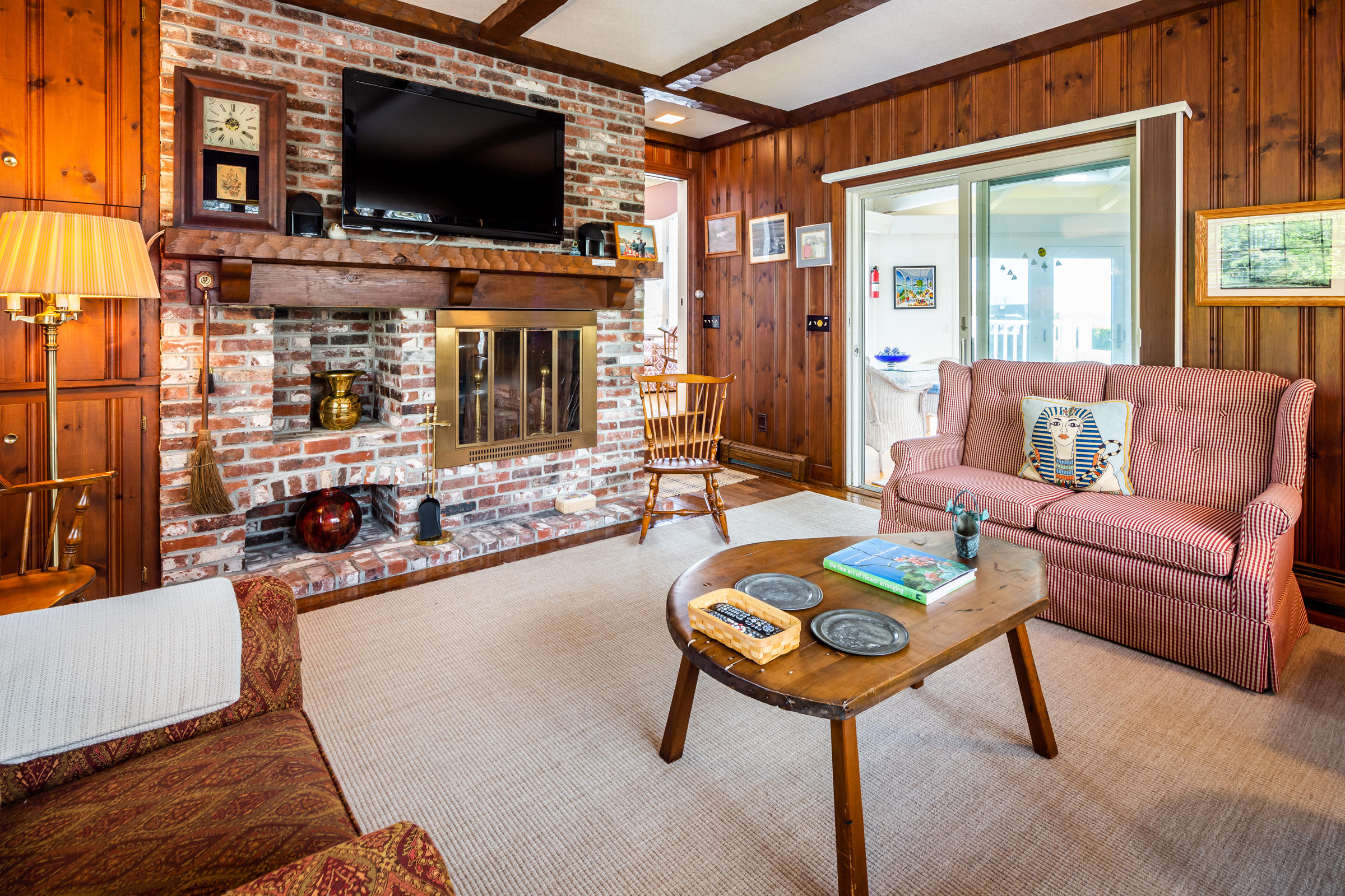 265 Bay Road Harwich, MA 02645 - Photo 6 of 38 a living room with furniture and a flat screen tv