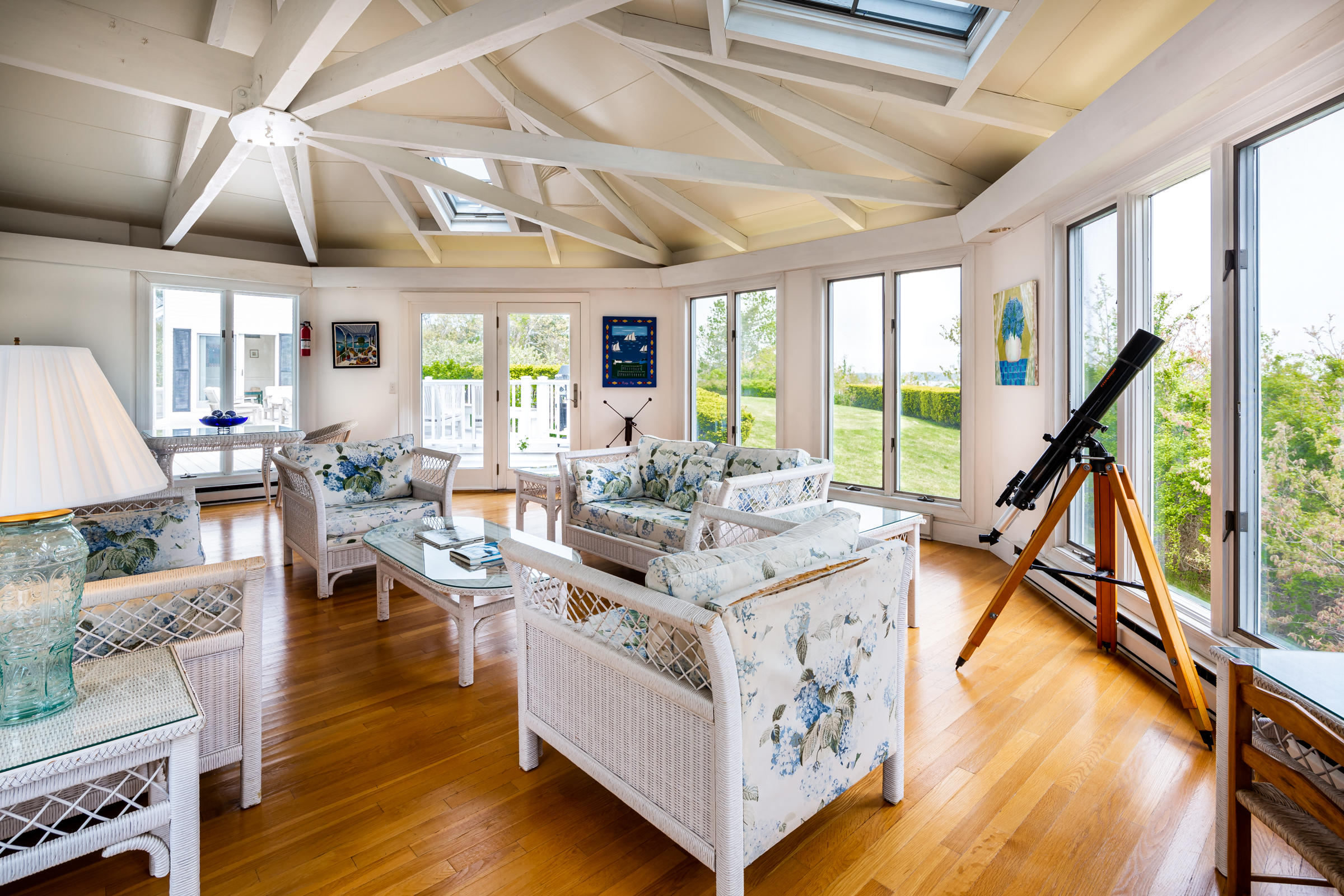 265 Bay Road Harwich, MA 02645 - Photo 7 of 38 a living room with furniture a wooden floor and a large window