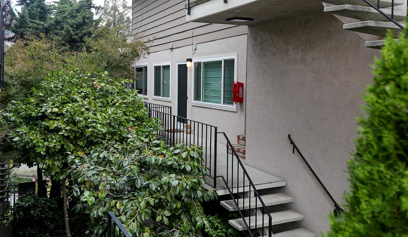 1124 Hollywood Avenue, Unit 3 Oakland, CA 94602 - Photo 11 of 11 a view of a balcony with chairs and potted plants