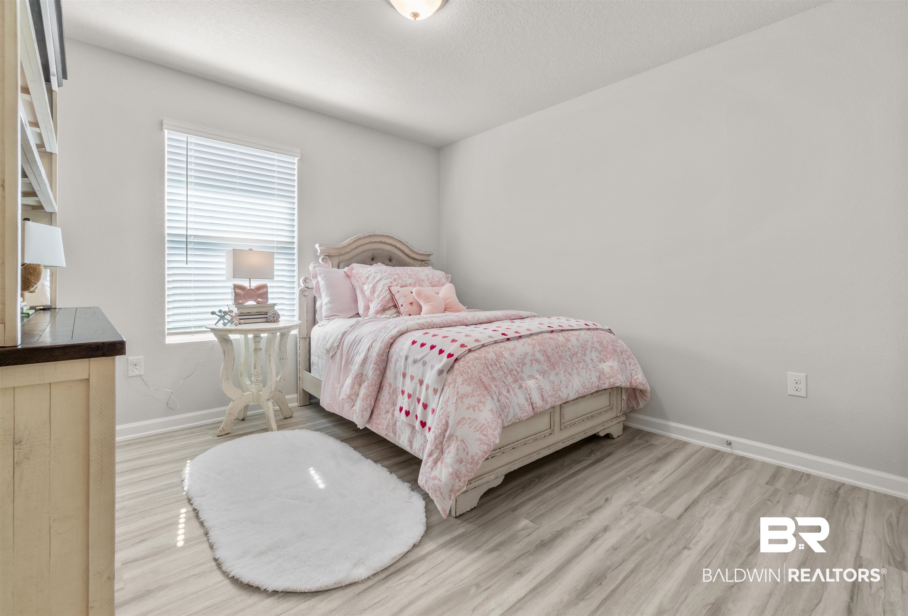 24472 Ringneck Loop Elberta, AL 36530 - Photo 24 of 46 Bedroom featuring light hardwood / wood-style floors