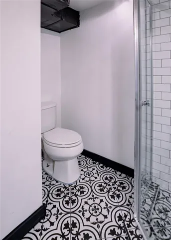 a bathroom with a sink and a toilet
