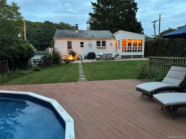 a view of a house with a back yard
