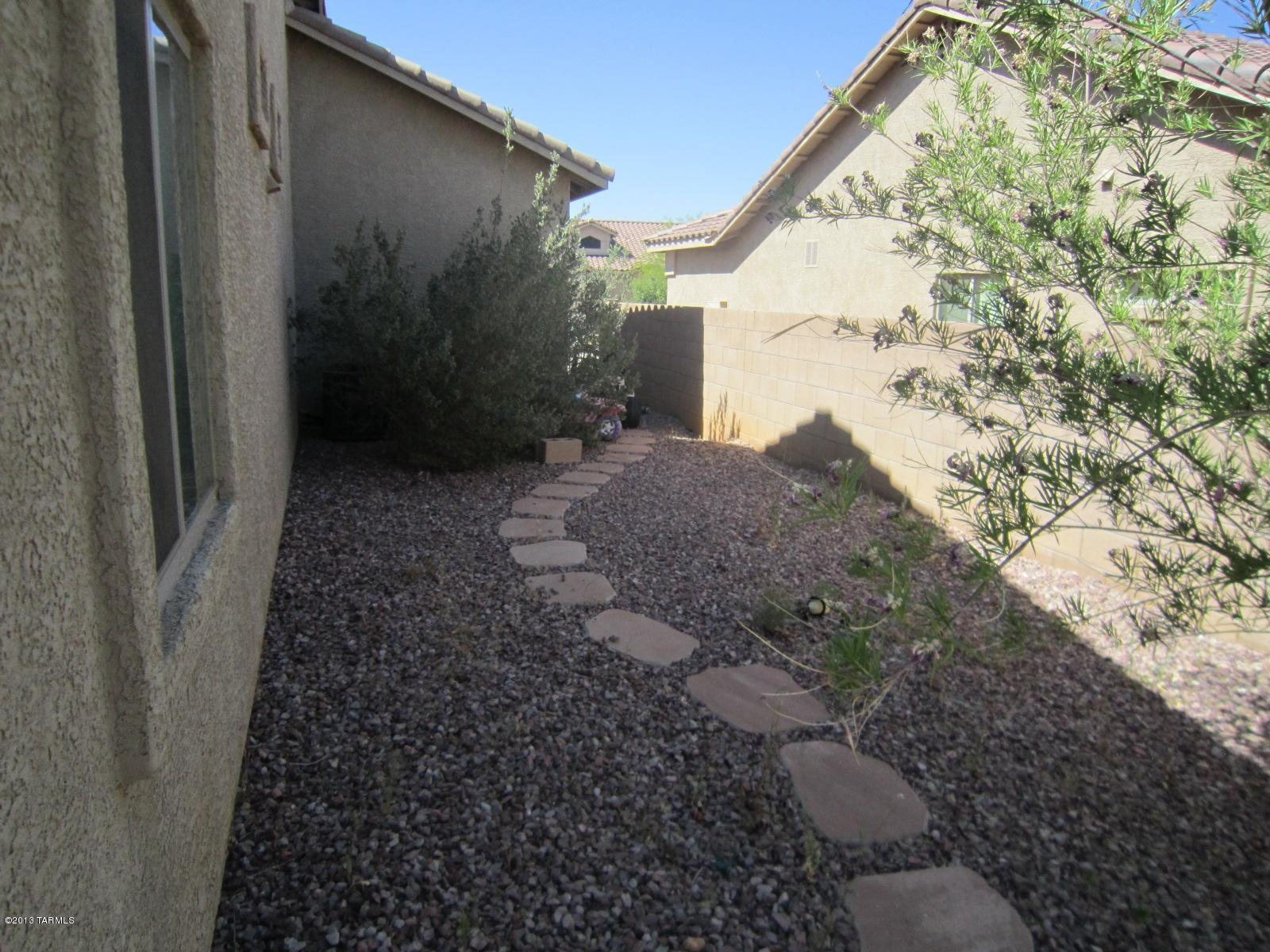 3580 East Northern Dancer Road Tucson, AZ 85739 - Photo 9 of 13 a view of backyard with green space