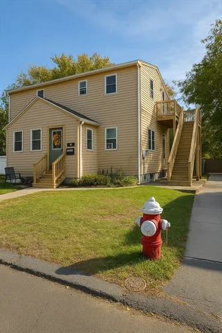 a front view of a house with yard