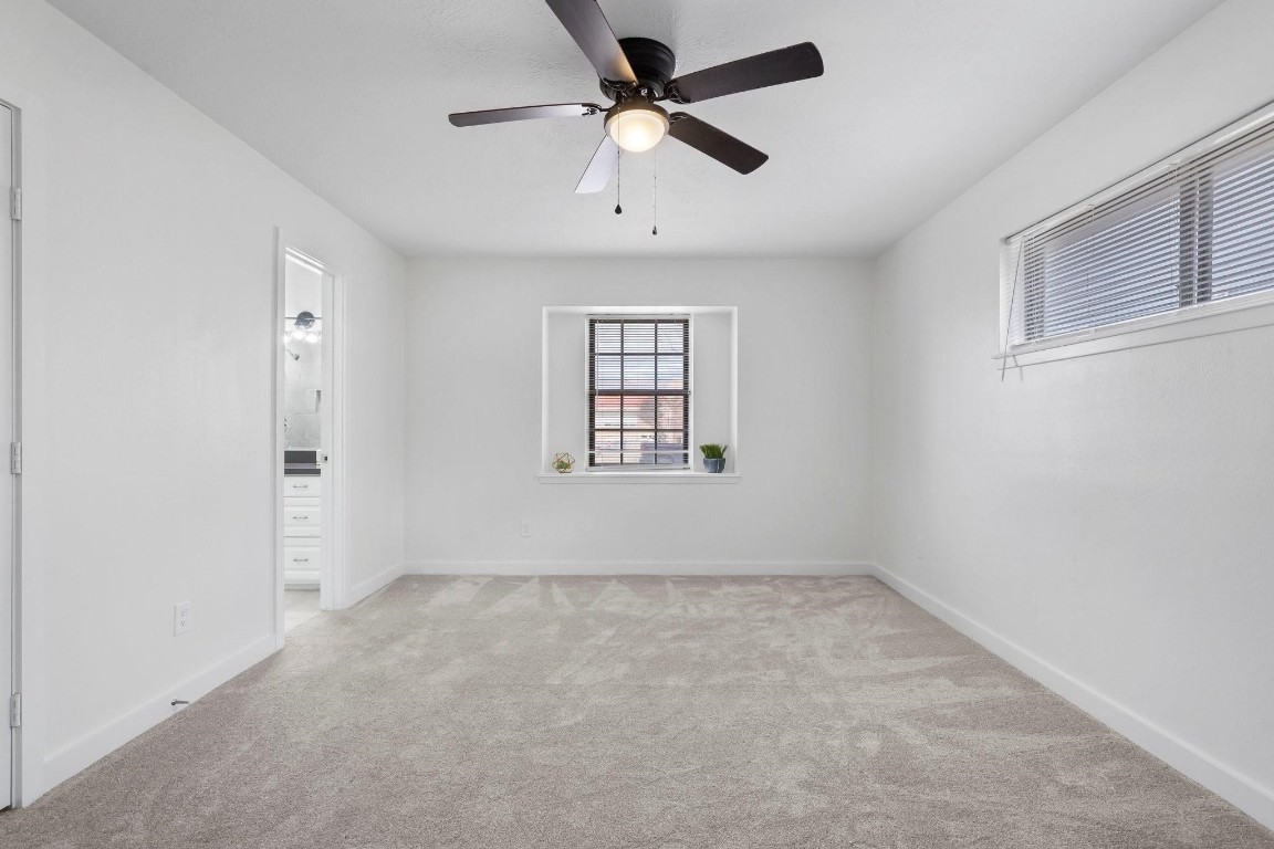 322 East Edgebrook Drive Houston, TX 77034 - Photo 21 of 38 a view of an empty room with a window