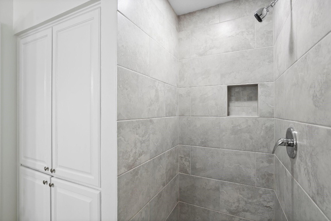 322 East Edgebrook Drive Houston, TX 77034 - Photo 25 of 38 a bathroom with a shower