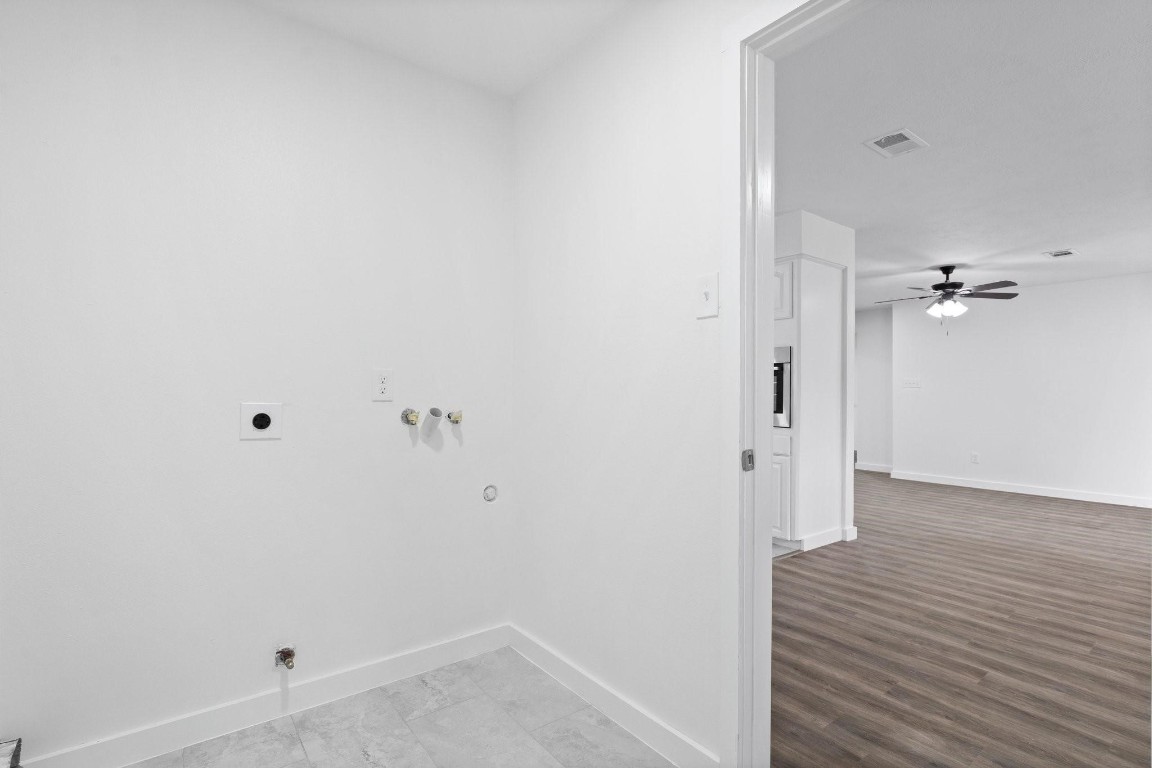 322 East Edgebrook Drive Houston, TX 77034 - Photo 26 of 38 a view of a hallway with wooden floor