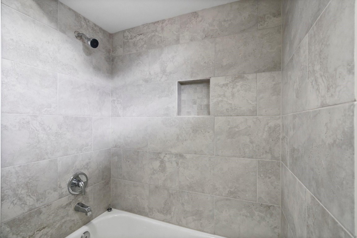 322 East Edgebrook Drive Houston, TX 77034 - Photo 33 of 38 a bathroom with a shower and a toilet