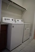 a bathroom with a tub and a toilet