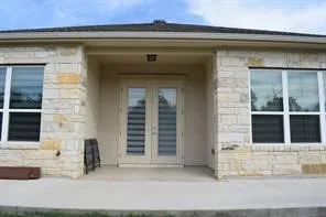 a house view with a backyard space