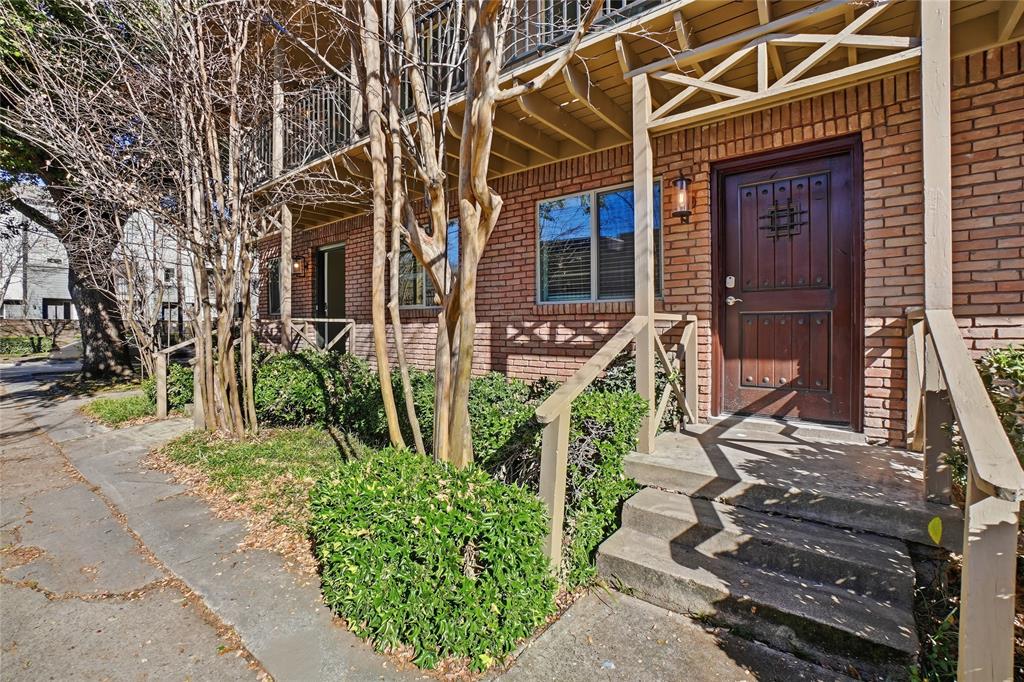 3310 Douglas Avenue, Unit B Dallas, TX 75219 - Photo 1 of 1 front view of a house with a small yard