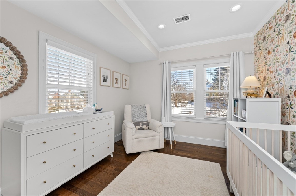 72-74 Manthorne Road, Unit 74 Boston, MA 02132 - Photo 13 of 22 a living room with furniture and windows